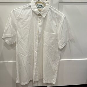 Theory. White, short sleeved button down with pocket on left breast.